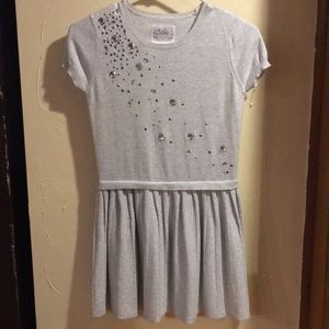 Very sparkly dress! Justice!